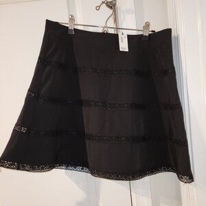 Limited black skirt with lace detail